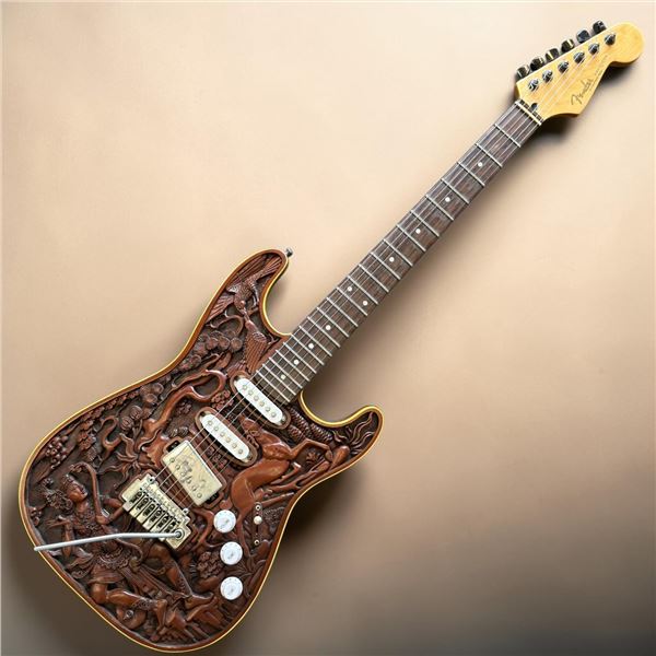 Electric Guitar with Fender Stratocaster Head and Intricate Carved Wood Balinese-Style Design