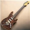 Image 1 : Electric Guitar with Fender Stratocaster Head and Intricate Carved Wood Balinese-Style Design