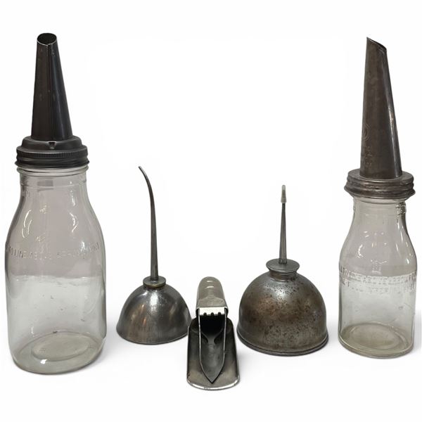 Group of Vintage Glass Motor Oil Bottles with Metal Spouts and Oil Cans