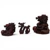 Image 1 : Vintage Hand-Carved Red Resin Chinese Dragon Statues - Sold in sets to represent luck, success, and 