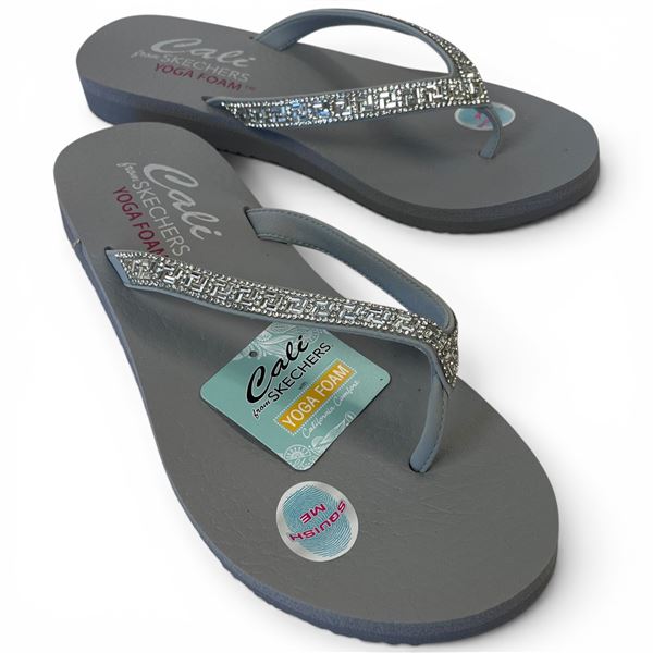 New in Box Pair of Skechers "Cali" Silver Yoga Foam Sandals - Size 10