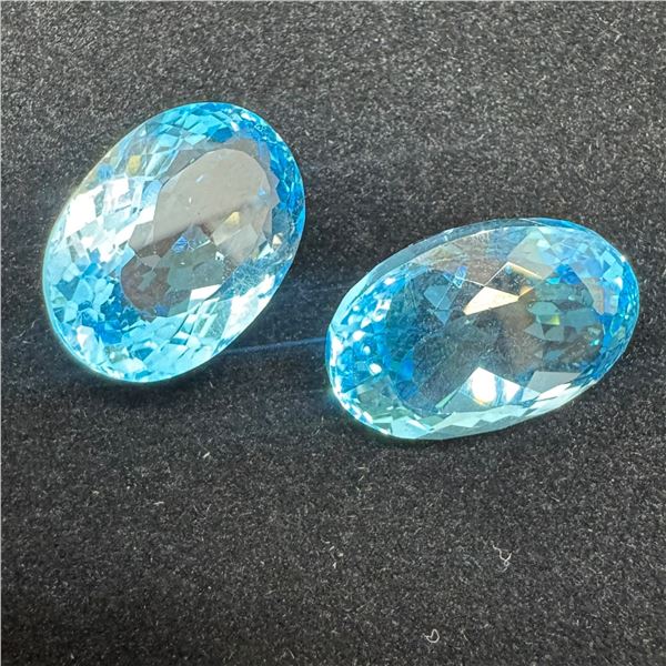 Pair of Natural Royal Blue Topaz Gemstones - 65.56 CTW (Oval Mixed Cut - 22.5 x 15.8 x 13.4mm each)