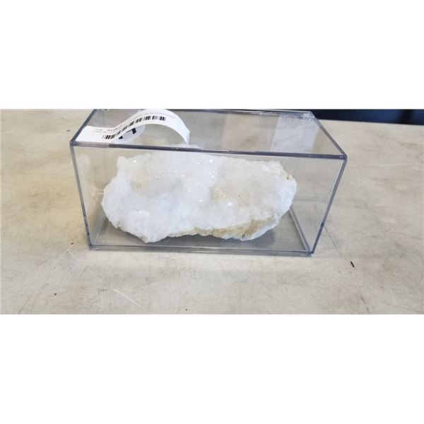 LARGE CHUNK OF QUARTZ IN SHOWCASE
