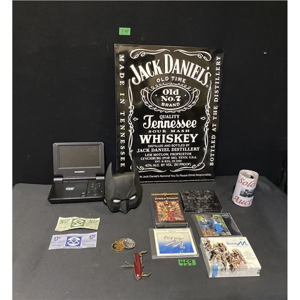 DVD player, music CDs, pocket knife, tin wall art, batman mask and more