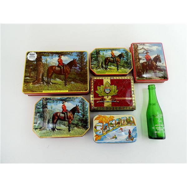 ASSORTED VINTAGE RCMP TOFFEE TINS AND GINGER ALE BOTTLE LOT