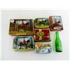 Image 1 : ASSORTED VINTAGE RCMP TOFFEE TINS AND GINGER ALE BOTTLE LOT