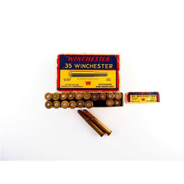 COLLECTIBLE ASSORTED .35 WIN AMMO AND NON-PRIMED BRASS CASES LOT