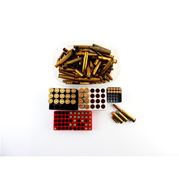 ASSORTED AMMO AND NON-PRIMED BRASS CASES LOT