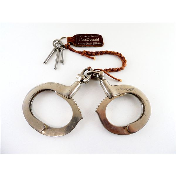 H. & R. ARMS COMPANY ANTIQUE HANDCUFFS