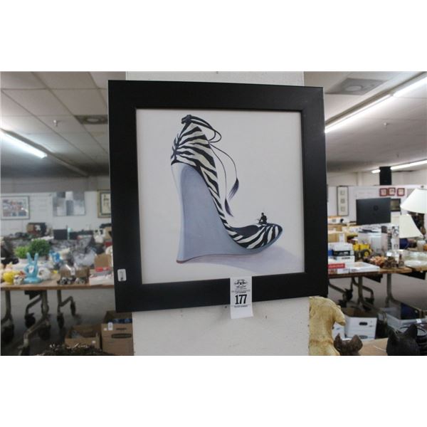 Framed Wall Art Man Sitting On Oversized Ladies Footwear