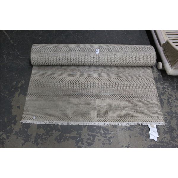 Beige Area Rug Approx. 5'  X  7'
