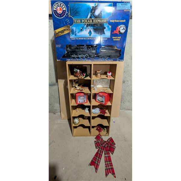 Lionel Polar Express Train Set with Christmas Decorations and Display Shelf