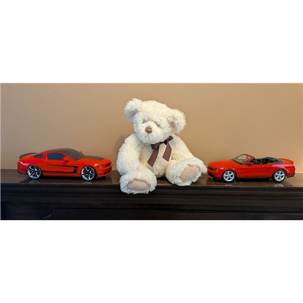 Two Model Cars and Stuffed Teddy