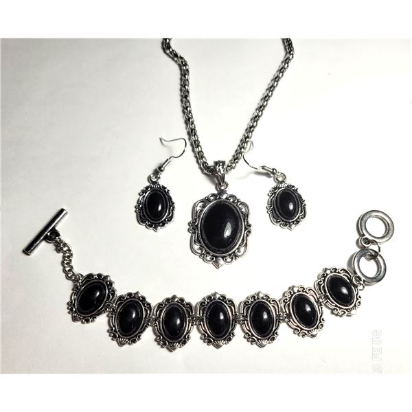 28) SUITE OF SILVER TONE AND BLACK