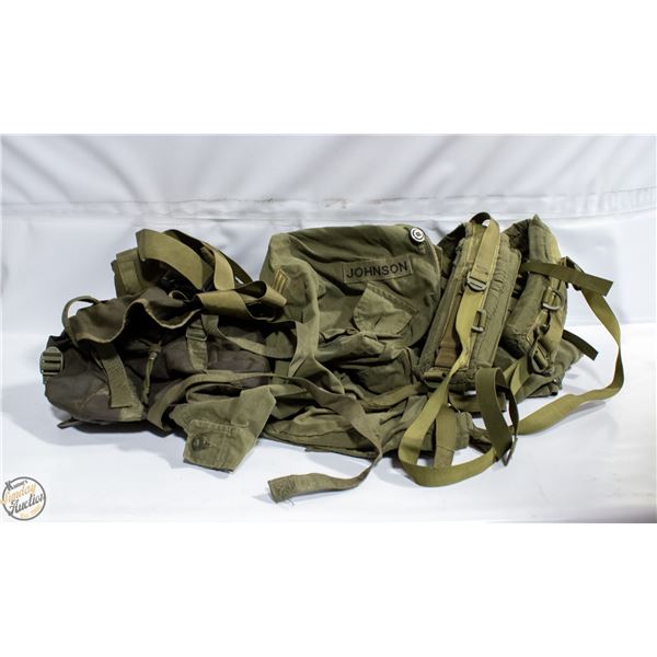 FLAT OF MILITARY GEAR AND JACKET INCLUDES