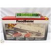 Image 1 : VINTAGE FOOD SAVER WITH BAGS