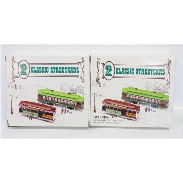 2 BOXES EACH W/ 2 HO SCALE STREETCARS NEW IN