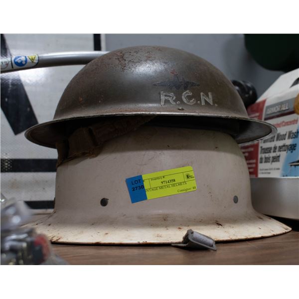 2 VINTAGE METAL HELMETS