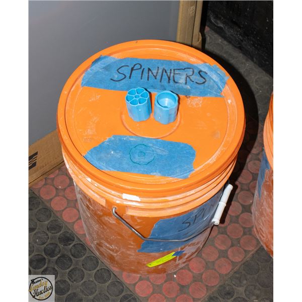 BUCKET FULL OF ROTATING POMMEL CAPS