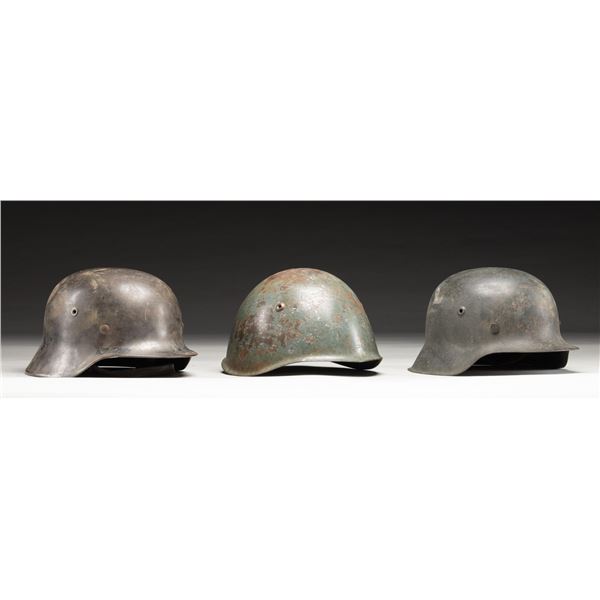 3 WWII AXIS HELMETS.