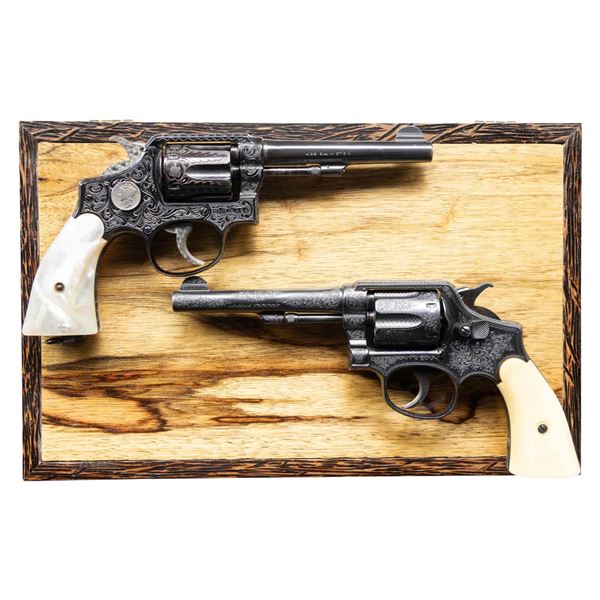PAIR OF ENGRAVED SMITH & WESSON VICTORY MODEL DA