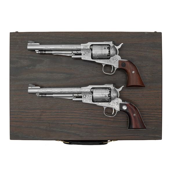 CASED PAIR OF DUBBER ENGRAVED RUGER STAINLESS