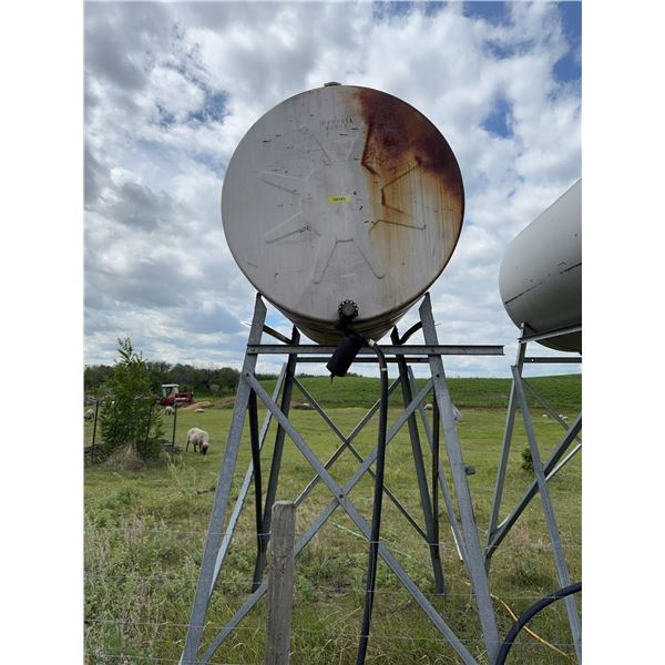 Cylindrical metal fuel  tank mounted on a metal stand, suitable for fuel or 