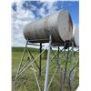 Image 4 : Cylindrical metal fuel  tank mounted on a metal stand, suitable for fuel or 