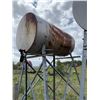 Image 7 : Cylindrical metal fuel  tank mounted on a metal stand, suitable for fuel or 