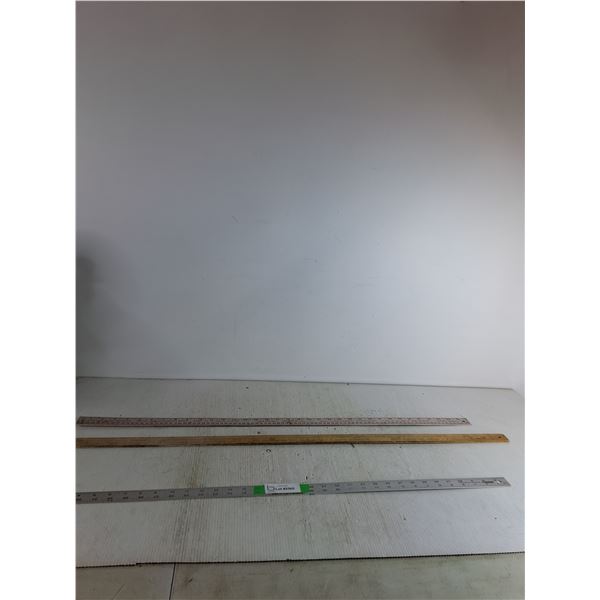 (2) Metre Sticks ( as is, cannot ship)