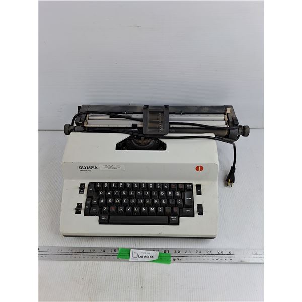 Olympia Electric 45 Typewriter - Powers On, As Is, Might Need Repair