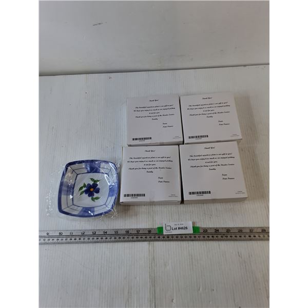(4) Small Plastic Plates