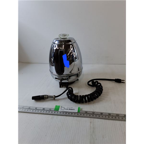 Electric Coffee/Tea Pot Turns On