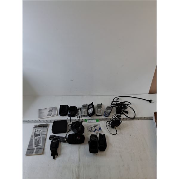 (4) Retro Cell Phones, (3) Energizer Batteries, (2) User Manuals, Misc Cords and Landline Phone Stan
