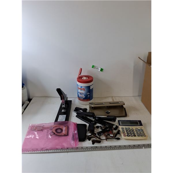 (4) Staplers, (4) Staple Pullers, Tax Calculator, Hole Puncher, Disinfectant Wipes, Computer Part
