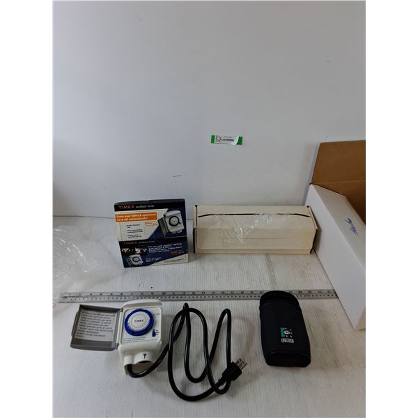Box of Plastic Wrap, Timex Outdoor Timer, Untested Logitech Case