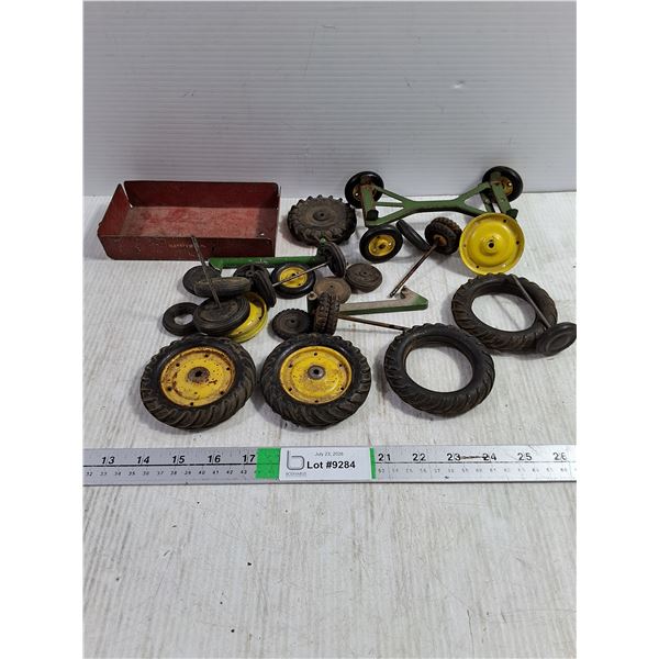 Lot of Assorted John Deere Toy Tractor Parts-Various Size Wheels,Axles with Massey Wagon Bed
