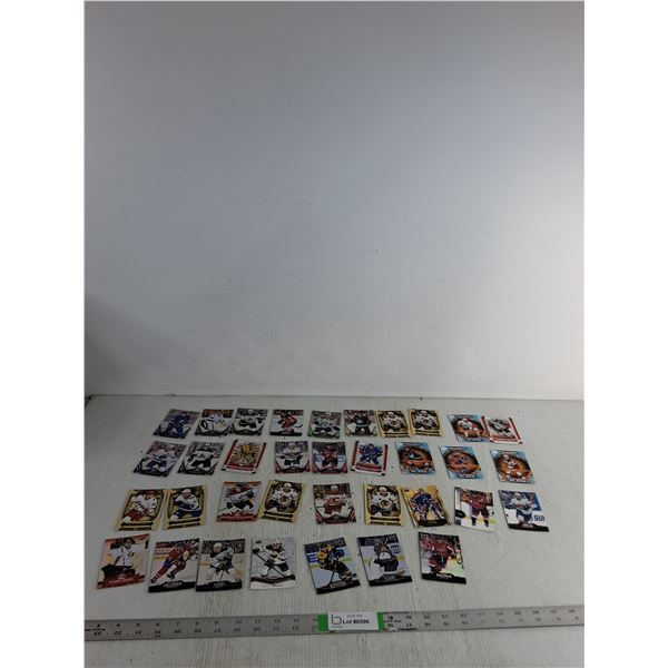 (25) Hockey Cards; Carey Price, Quinn Hughes, Seth Jones ( as is, cannot authenticate)