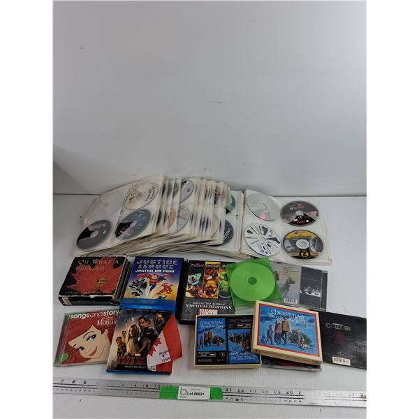 Assorted DVDs & Christmas Throughout The Years Tapes