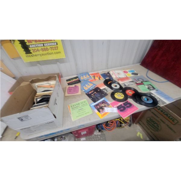 Collection of Vintage 45 RPM and Extended Play Vinyl Records with Sleeves and More