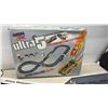 Image 4 : Aurora AFX Skyway Patrol HO Scale Road Set and Ultra 5 Grand Challenge Slotless Race Set.