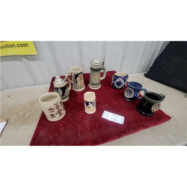 Collection of German Stoneware Beer Steins with Pewter Lids and Relief Scenes and More