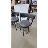 Image 2 : Set of Four Dark Grey Upholstered Swivel Bar Stools with Black Metal Frames and Curved Backrests