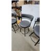 Image 3 : Set of Four Dark Grey Upholstered Swivel Bar Stools with Black Metal Frames and Curved Backrests