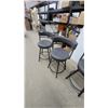 Image 4 : Set of Four Dark Grey Upholstered Swivel Bar Stools with Black Metal Frames and Curved Backrests