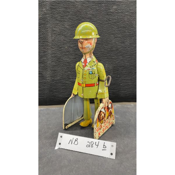 Vintage Unique Art G.I. Joe and the K-9 Pups Wind-Up Tin Toy, Circa 1940s, 9" Tall