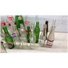 Image 6 : Collection of Vintage Glass Soda Bottles: Coca-Cola, Pepsi, 7UP, Canada Dry, Wynola, and More