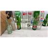 Image 7 : Collection of Vintage Glass Soda Bottles: Coca-Cola, Pepsi, 7UP, Canada Dry, Wynola, and More
