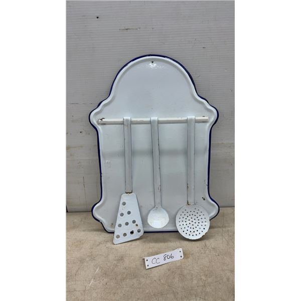Vintage White Enamelware Kitchen Utensil Rack with Blue Trim, Spatula, Ladle, and Skimmer
