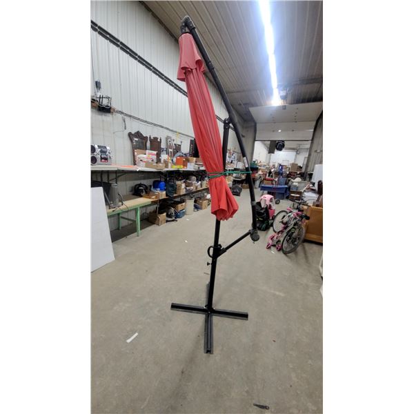 Red Cantilever Offset Patio Umbrella with Black Metal Frame and Cross Base